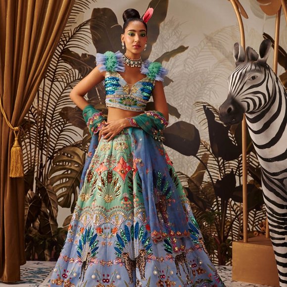 Payal and Zinal Sovreign of Leopard Lehenga. - Picture 2 of 5